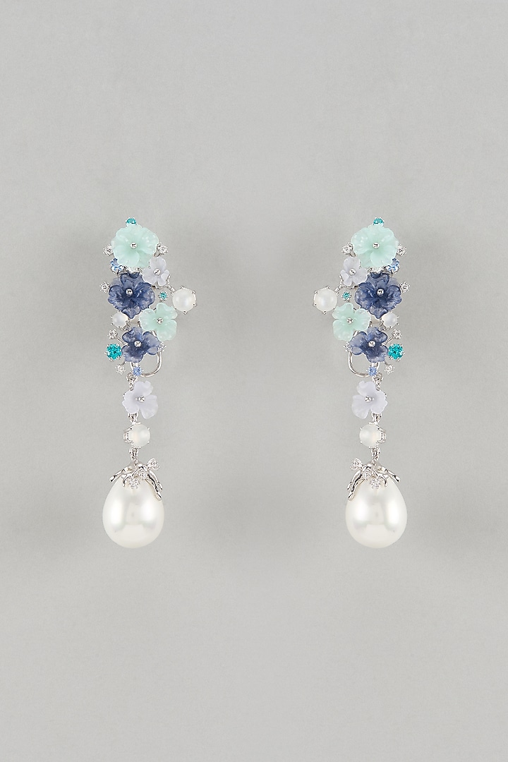 White Finish Cubic Zirconia & Blue Stone Floral Dangler Earrings In Sterling Silver by Raeesa Jewels by Sanjana and Ritu at Pernia's Pop Up Shop