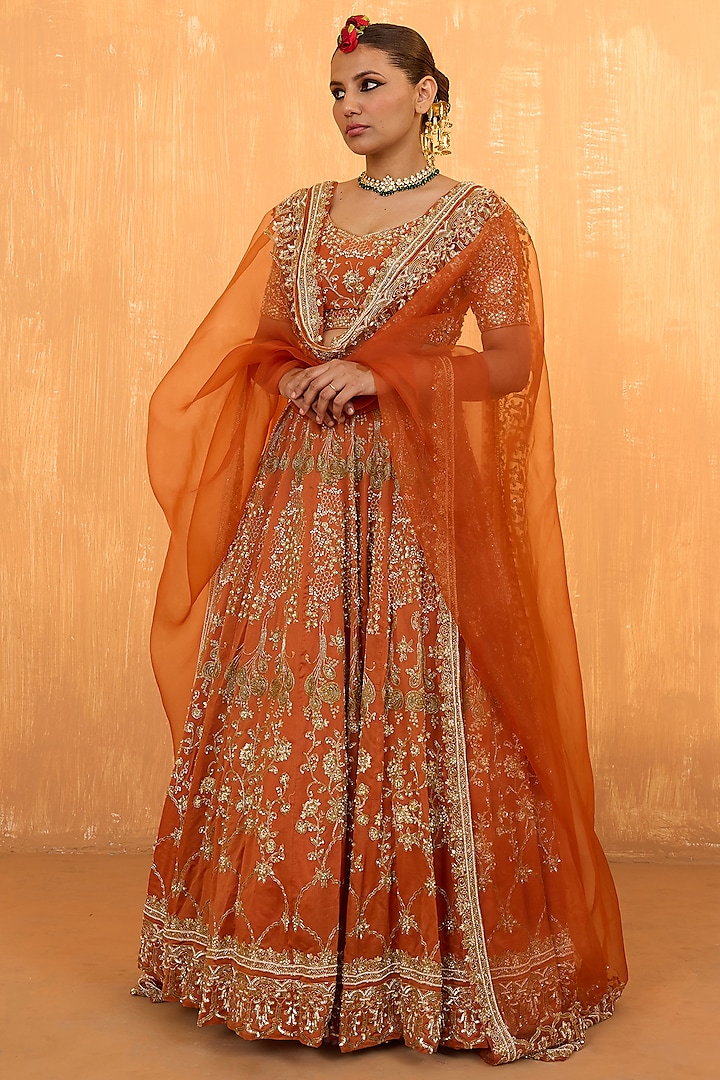 Orange Rust Silk Chanderi Pearl Hand Embroidered Wedding Lehenga Set by Radha Sharma at Pernia's Pop Up Shop