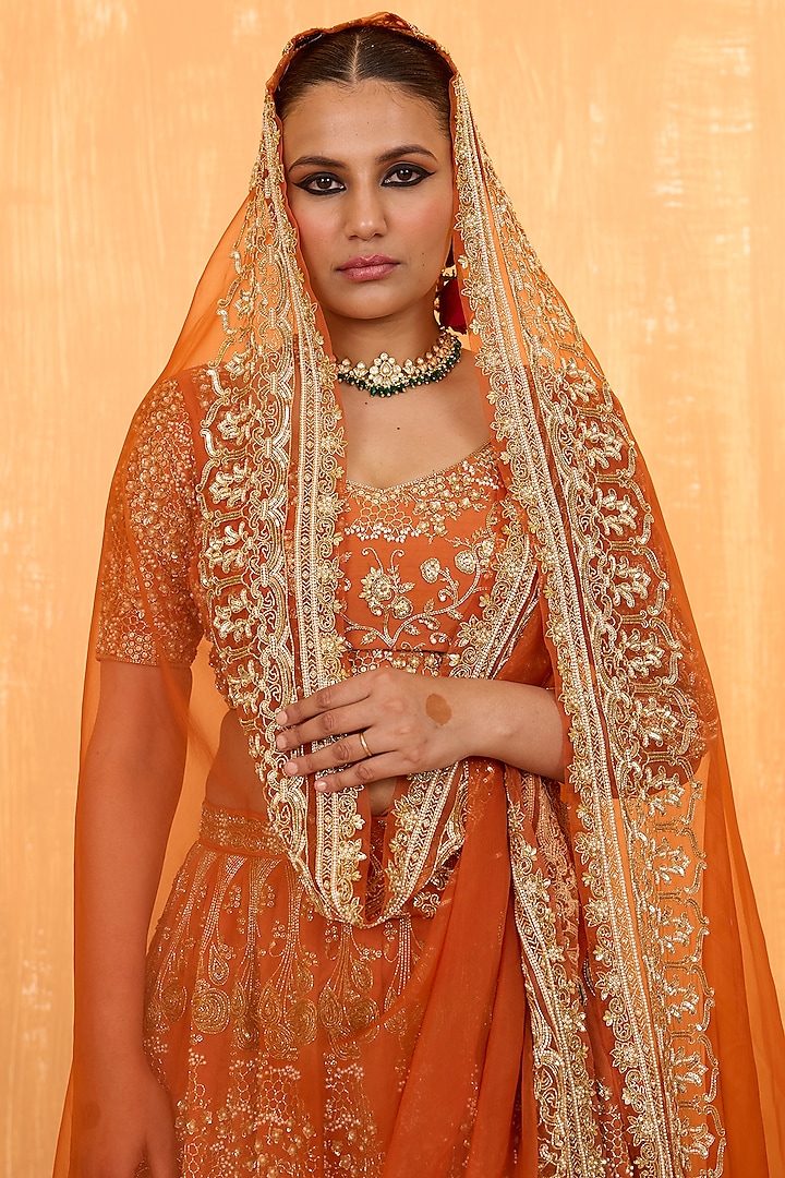 Orange Rust Silk Chanderi Pearl Hand Embroidered Bridal Lehenga Set by Radha Sharma at Pernia's Pop Up Shop