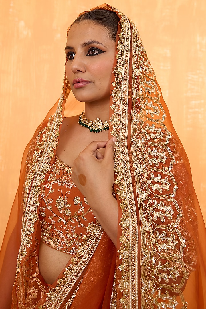 Orange Rust Silk Chanderi Pearl Hand Embroidered Bridal Lehenga Set by Radha Sharma at Pernia's Pop Up Shop
