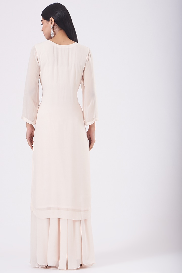 Blush Pink Hand Embroidered Kurta Set by Radha Sharma at Pernia's Pop Up Shop
