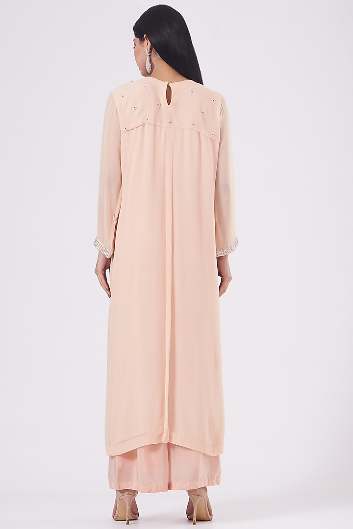 Light Peach Hand Embroidered Kurta Set by Radha Sharma at Pernia's Pop Up Shop