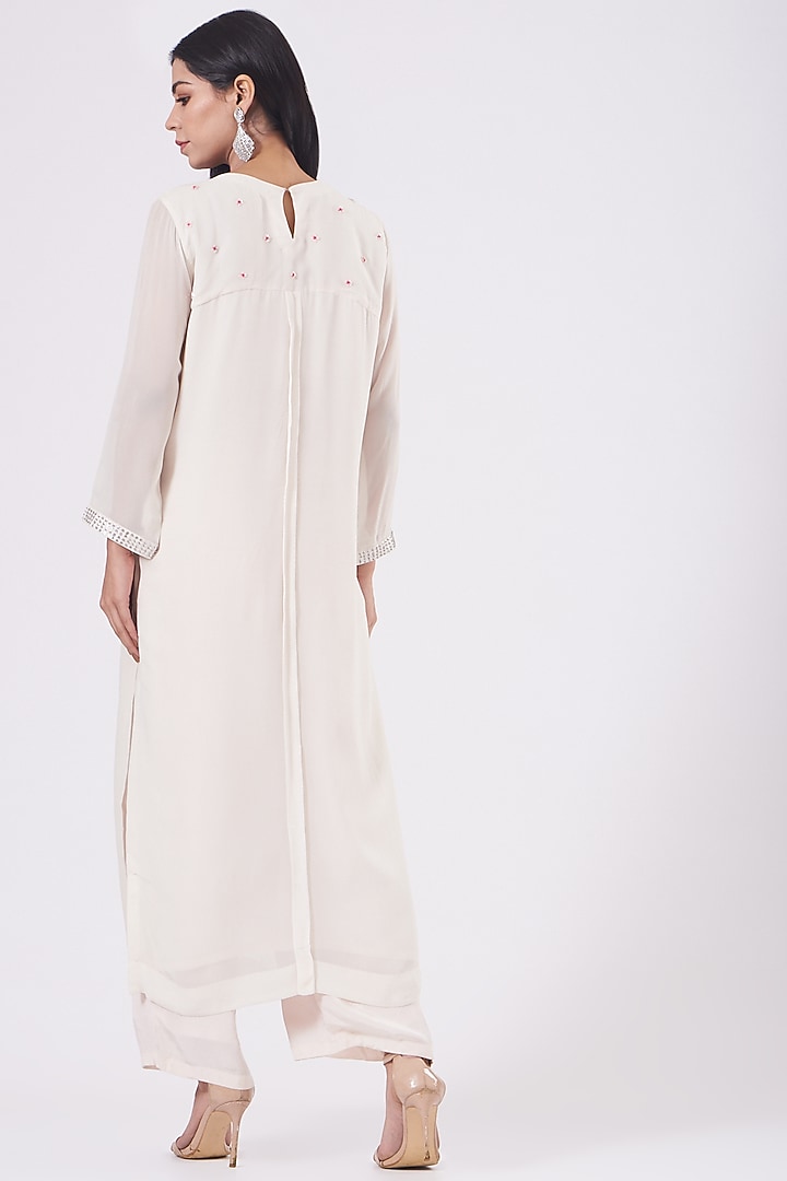 Blush Pink Embroidered Kurta Set by Radha Sharma at Pernia's Pop Up Shop