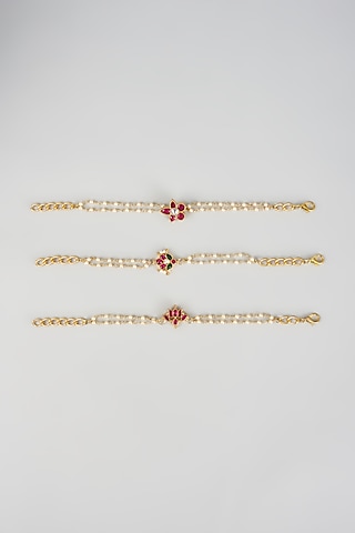 Gold Finish Kundan Polki & Seed Pearl Bracelets (Set of 3) by Raga Baubles