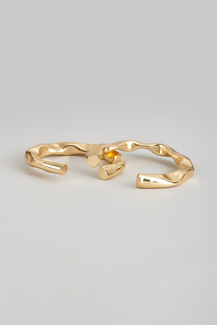 Gold Plated Textured Bangles (Set of 2) by Raga Baubles at Pernia's Pop Up Shop