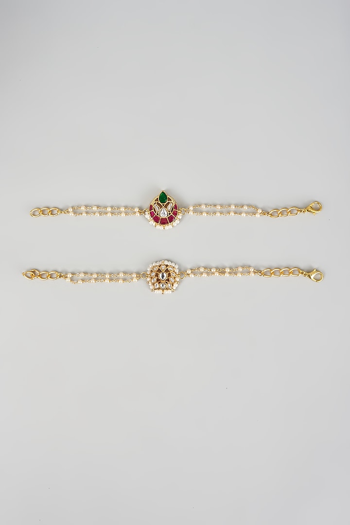 Gold Finish Kundan Polki & Seed Pearl Bracelets (Set of 2) by Raga Baubles