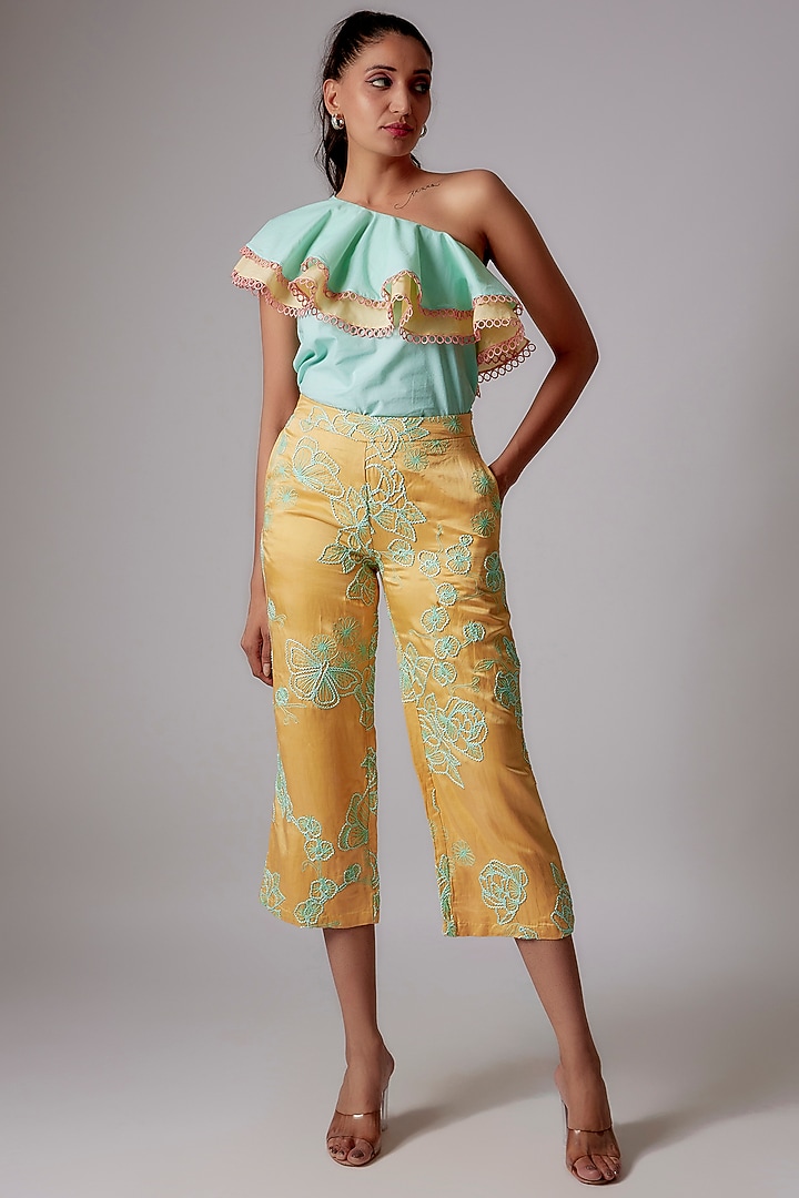 Yellow Linen Satin Floral Embroidered Flared Pants by RADKA at Pernia's Pop Up Shop