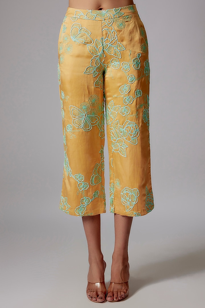 Yellow Linen Satin Floral Embroidered Flared Pants by RADKA at Pernia's Pop Up Shop
