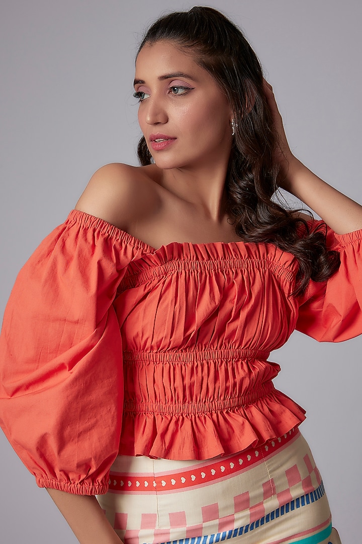 Red Cotton Poplin Peplum Top by RADKA at Pernia's Pop Up Shop