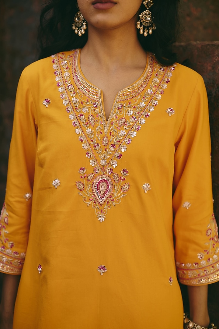 Mustard Yellow Satin Hand Embroidered Kurta Set by RASHIKA MITTAL at Pernia's Pop Up Shop