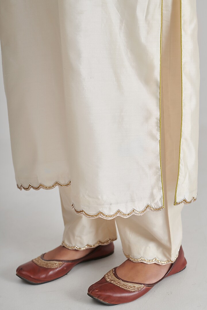 Ivory Silk Hand Embroidered Kurta Set by RASHIKA MITTAL at Pernia's Pop Up Shop