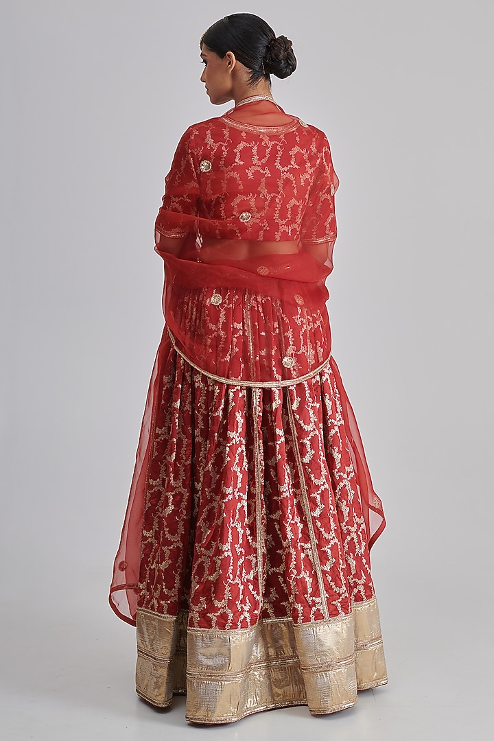 Red Brocade Silk Embroidered Wedding Lehenga Set by RASHIKA MITTAL at Pernia's Pop Up Shop