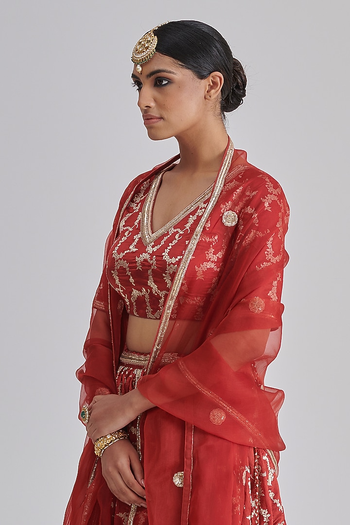 Red Brocade Silk Embroidered Wedding Lehenga Set by RASHIKA MITTAL at Pernia's Pop Up Shop