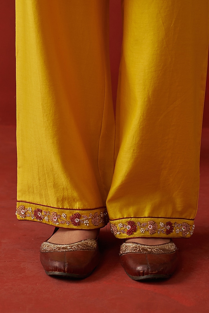 Yellow Chanderi Cutdana Hand Embroidered Kurta Set by RASHIKA MITTAL at Pernia's Pop Up Shop