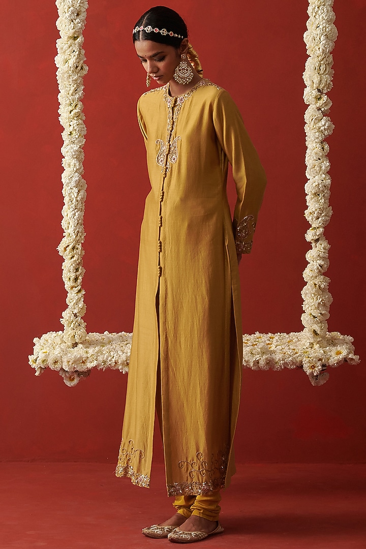 Yellow Chanderi Nakshi & Floral Embroidered Kurta Set by RASHIKA MITTAL at Pernia's Pop Up Shop