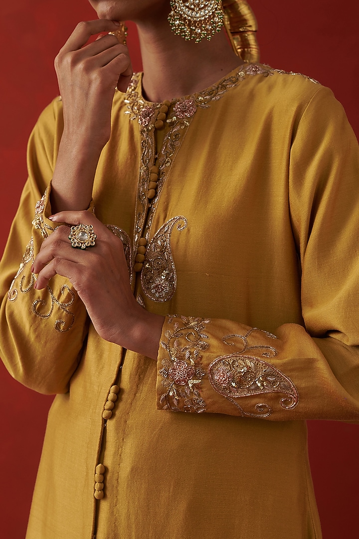 Yellow Chanderi Nakshi & Floral Embroidered Kurta Set by RASHIKA MITTAL at Pernia's Pop Up Shop