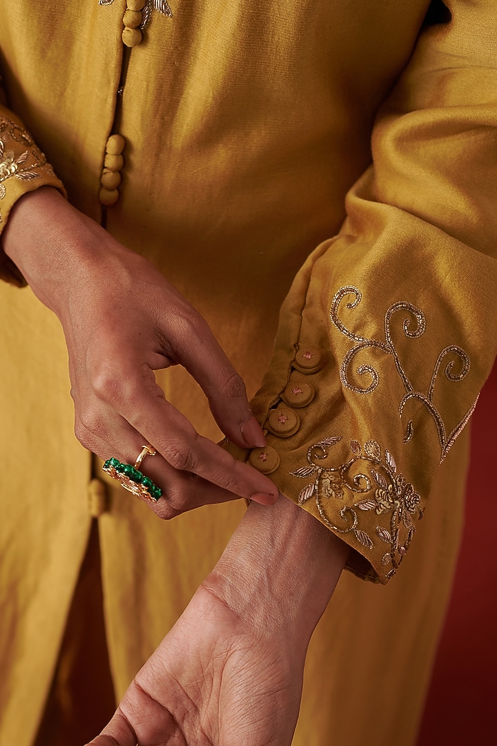Yellow Chanderi Nakshi & Floral Embroidered Kurta Set by RASHIKA MITTAL at Pernia's Pop Up Shop