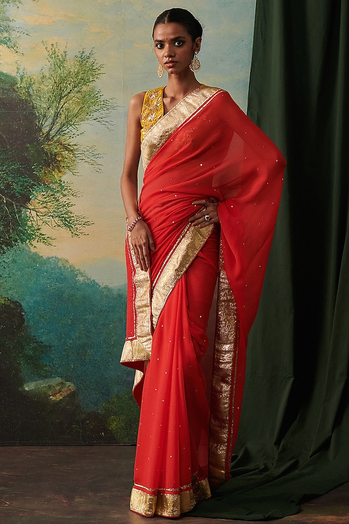 Orange Chiffon Lace Hand Embroidered Wedding Saree by RASHIKA MITTAL at Pernia's Pop Up Shop