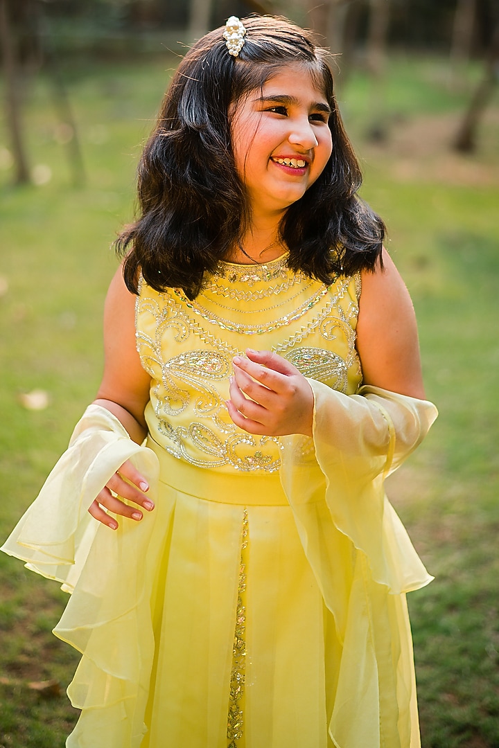 Dull Yellow Organza Embroidered Lehenga Set For Girls by Rani kidswear at Pernia's Pop Up Shop