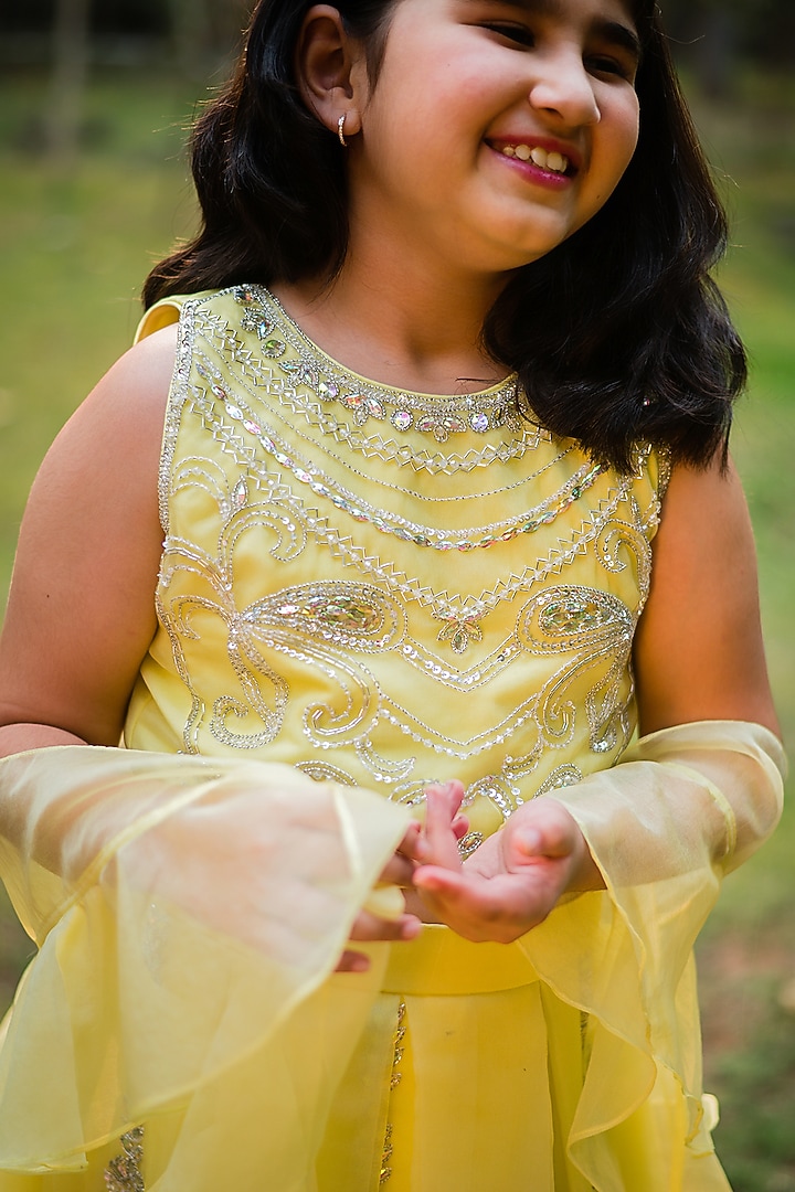 Dull Yellow Organza Embroidered Lehenga Set For Girls by Rani kidswear at Pernia's Pop Up Shop