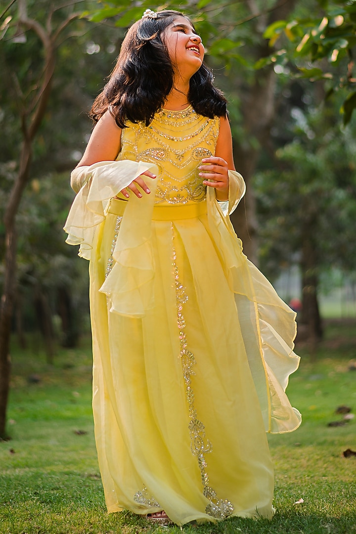 Dull Yellow Organza Embroidered Lehenga Set For Girls by Rani kidswear at Pernia's Pop Up Shop