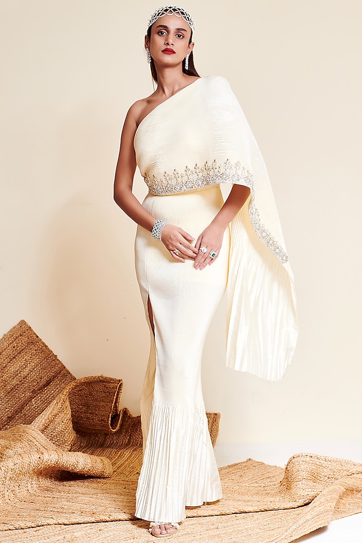 Ivory Taffeta & Pleated Fabric Embellished Gown by Reeti Arneja