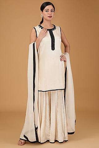 Ivory Cotton Satin Gharara Set by THE KLUB BY REETI ARNEJA