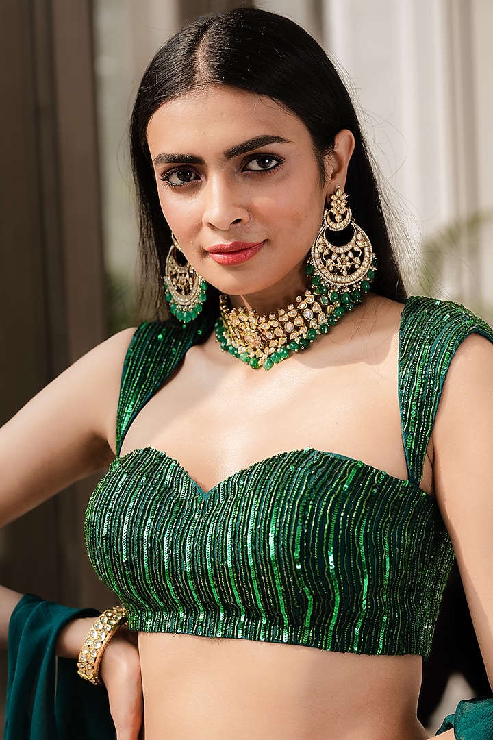 Emerald Green Pleated Wedding Lehenga Set by Rashika Sharma at Pernia's Pop Up Shop