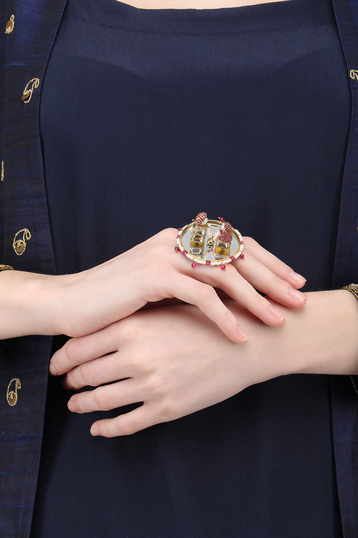 Gold plated rotating garland ring available only at Pernia's Pop Up Shop.