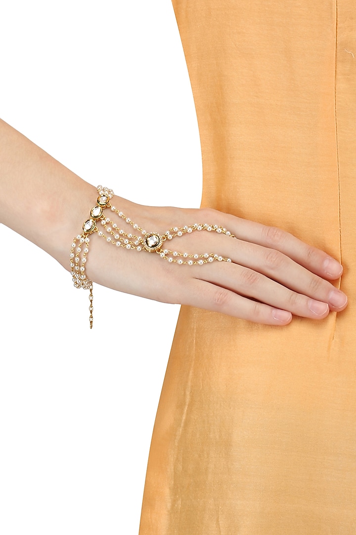 Set Of 2 Gold Plated Pearl Hand Harness by Raabta By Rahul