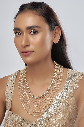 Gold Finish Kundan Polki & Pearl Necklaces (Set of 2) by Raga Baubles