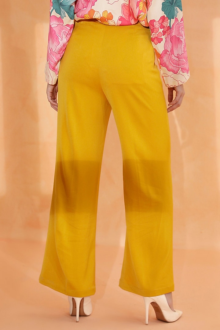 Mustard Yellow Banana Crepe Trousers by RADKA at Pernia's Pop Up Shop