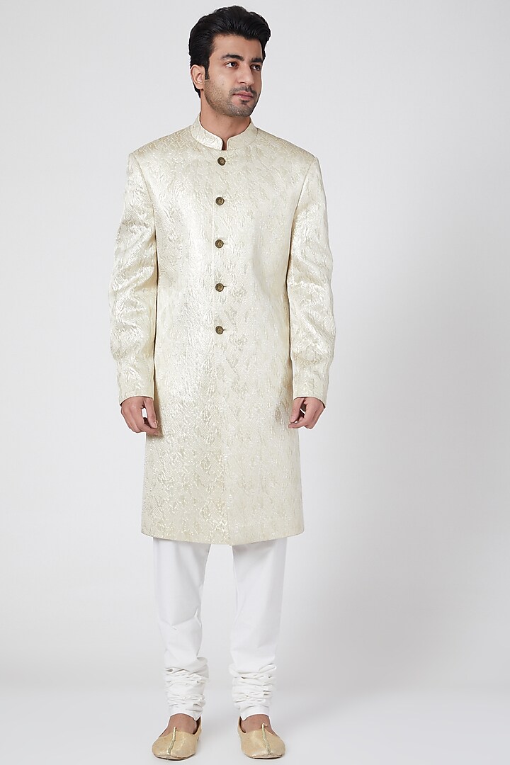 Ivory Groom Sherwani With Gold Buttons by Ravi Bajaj at Pernia's Pop Up Shop