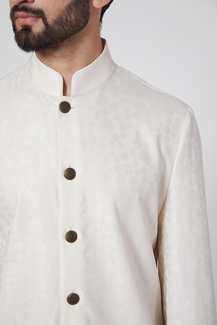 Ivory Silk Jacquard Achkan Kurta by Ravi Bajaj at Pernia's Pop Up Shop