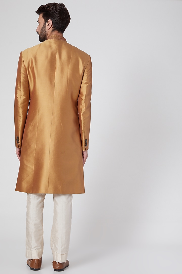 Orange Gold Silk Groom Sherwani by Ravi Bajaj at Pernia's Pop Up Shop