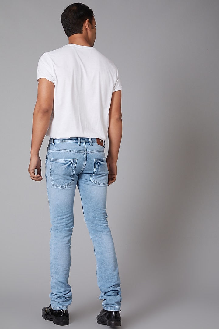 Sky Blue White Rose Embroidered Jeans by Rohit Bal Men at Pernia's Pop Up Shop