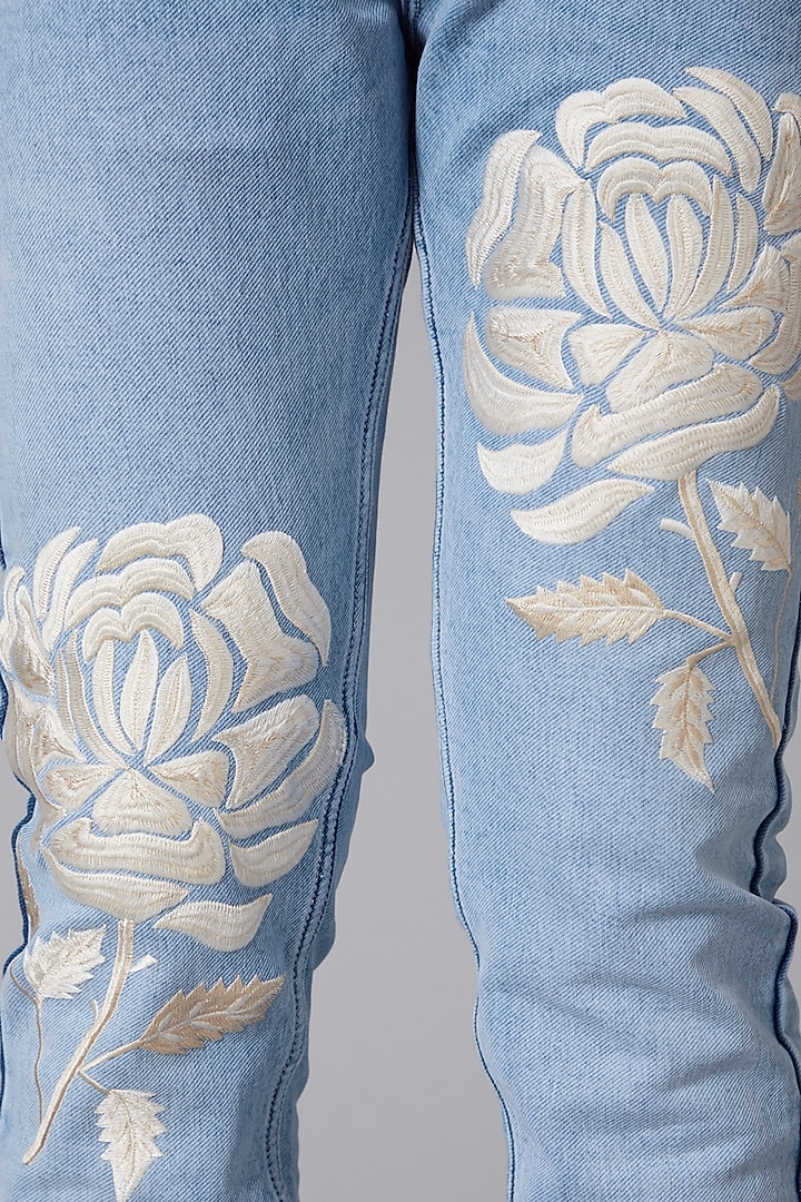 Sky Blue White Rose Embroidered Jeans by Rohit Bal Men at Pernia's Pop Up Shop