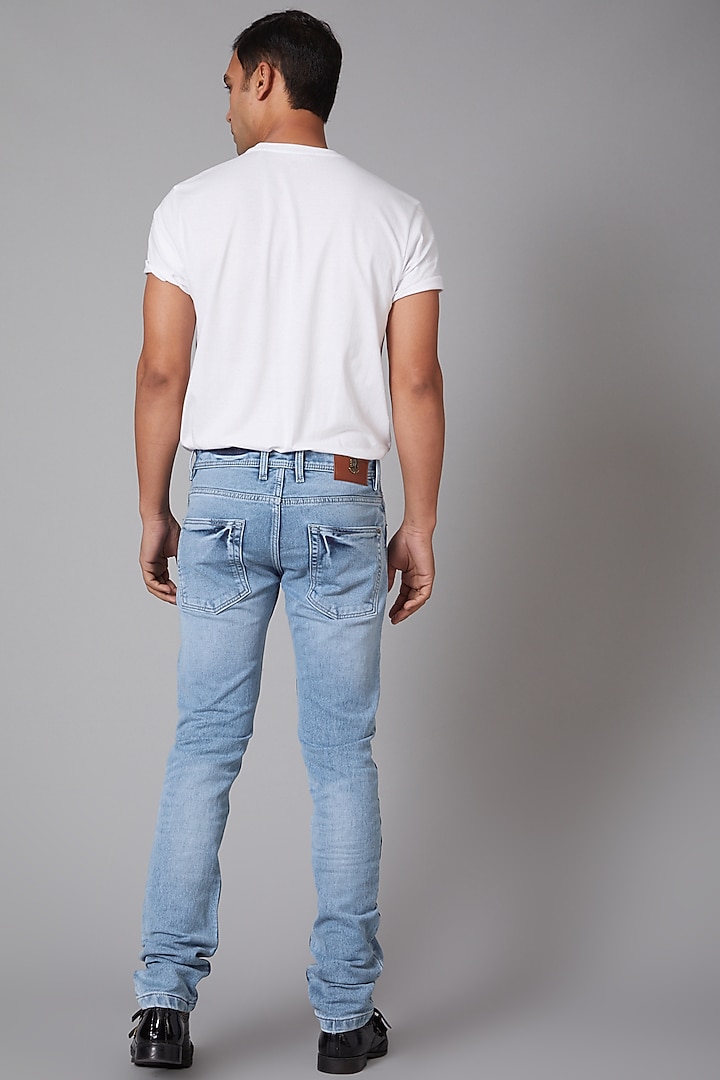 Sky Blue Eagle Embroidered Jeans by Rohit Bal Men at Pernia's Pop Up Shop
