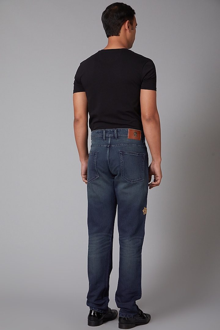 Cobalt Blue Crown Embroidered Cotton Jeans by Rohit Bal Men at Pernia's Pop Up Shop