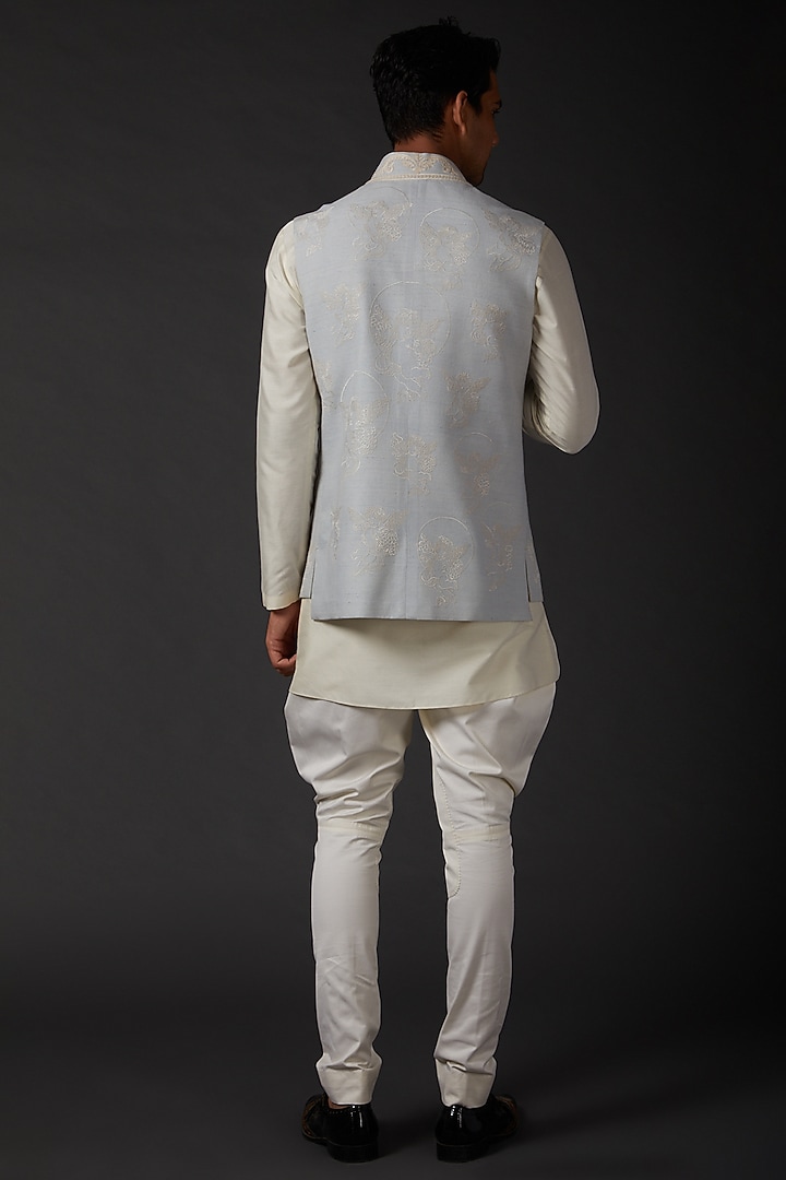 Powder Blue Matka Silk Machine Embroidered Bundi Jacket by Rohit Bal Men at Pernia's Pop Up Shop