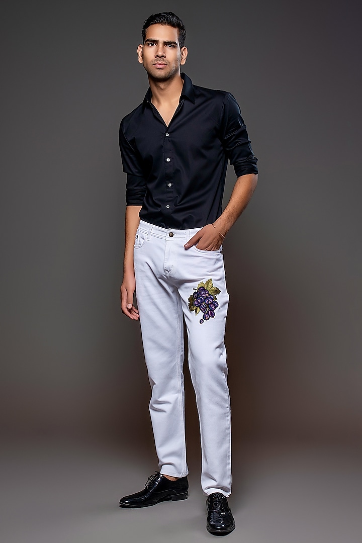Off-White Denim Floral Embroidered Jeans by Rohit Bal Men