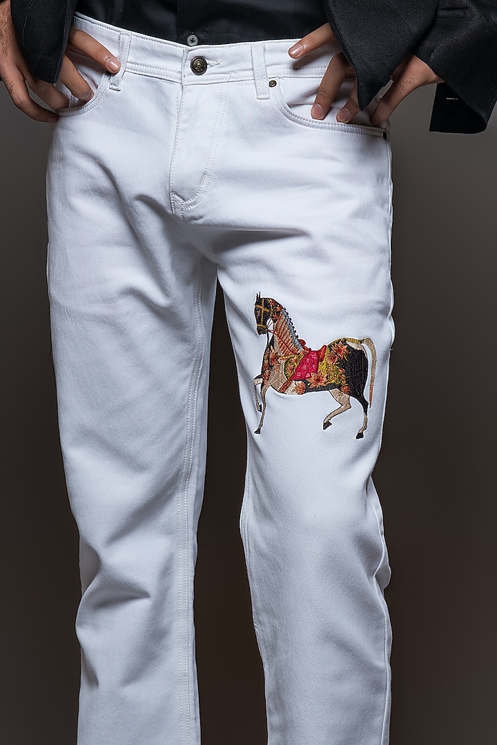 Off-White Denim Embroidered Jeans by Rohit Bal Men at Pernia's Pop Up Shop