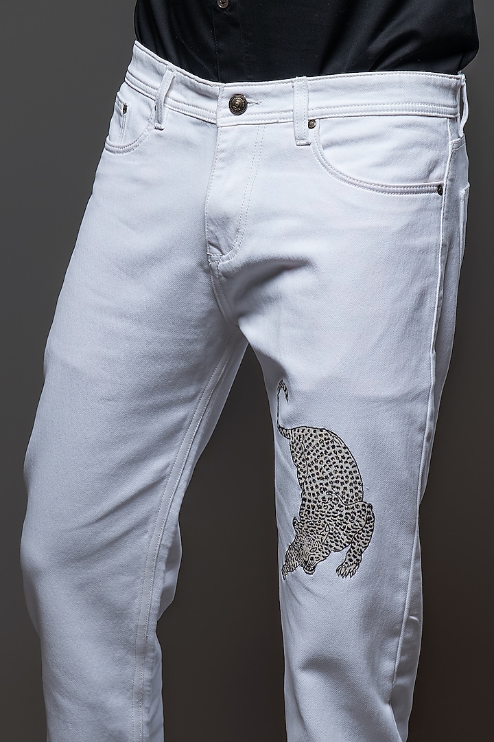 Off-White Denim Embroidered Jeans by Rohit Bal Men at Pernia's Pop Up Shop