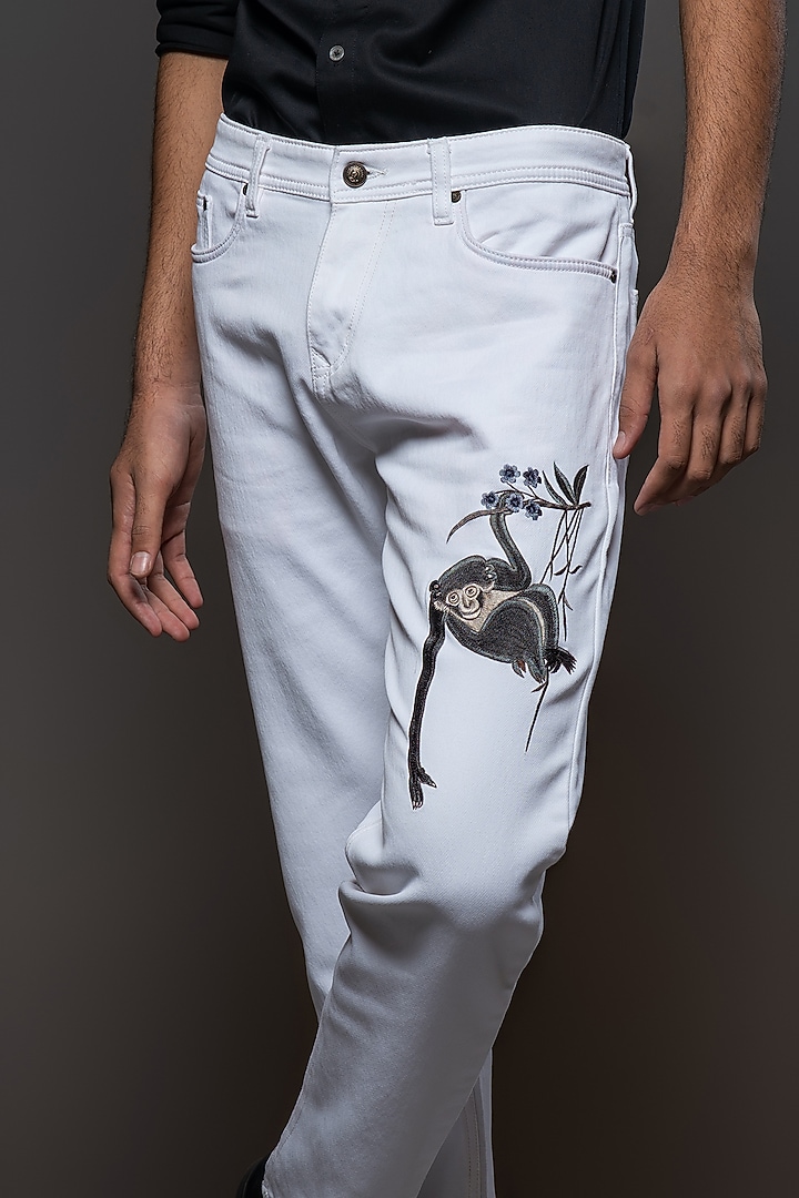 Off-White Denim Embroidered Jeans by Rohit Bal Men at Pernia's Pop Up Shop