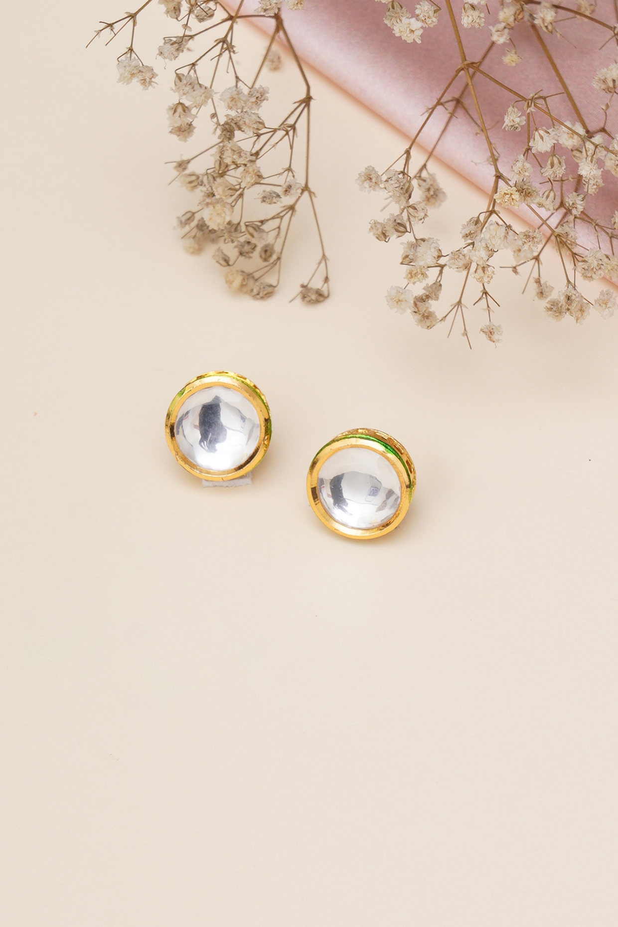 Gold Finish Kundan Polki Stud Earrings by RUBY RAANG