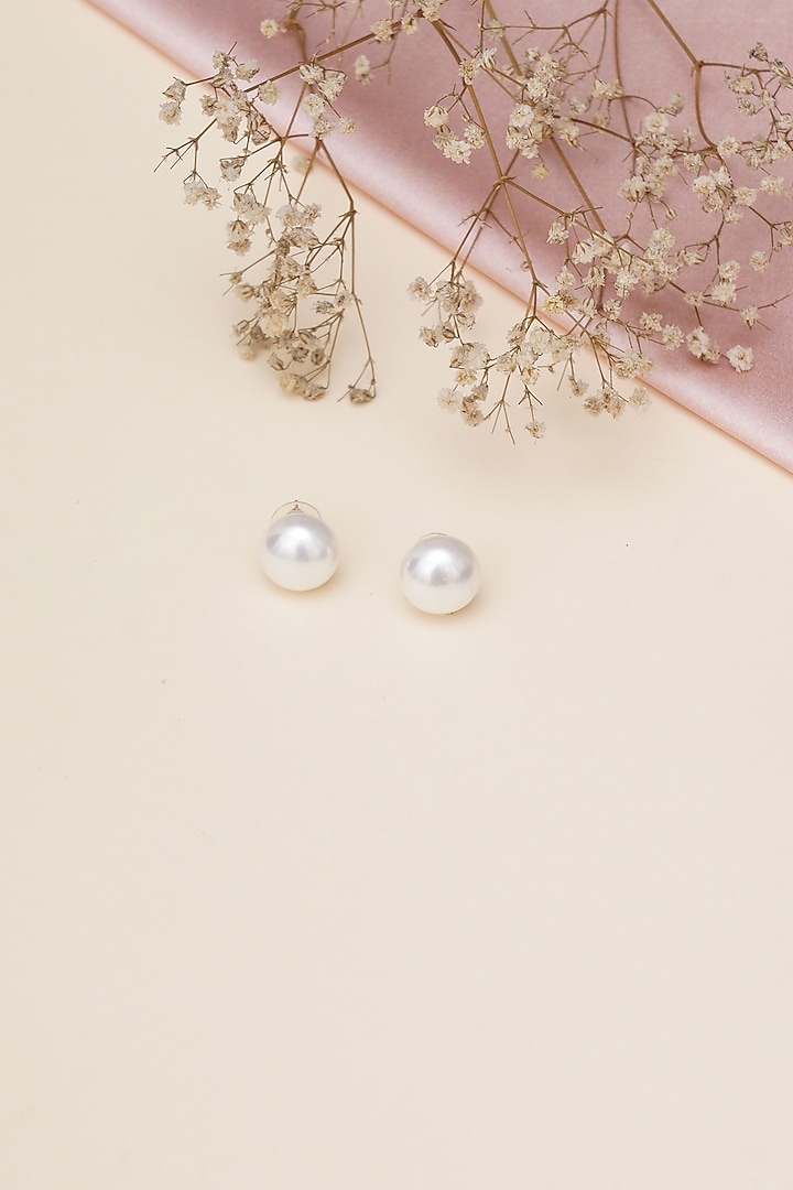 Gold Finish Pearl Stud Earrings by RUBY RAANG MEN