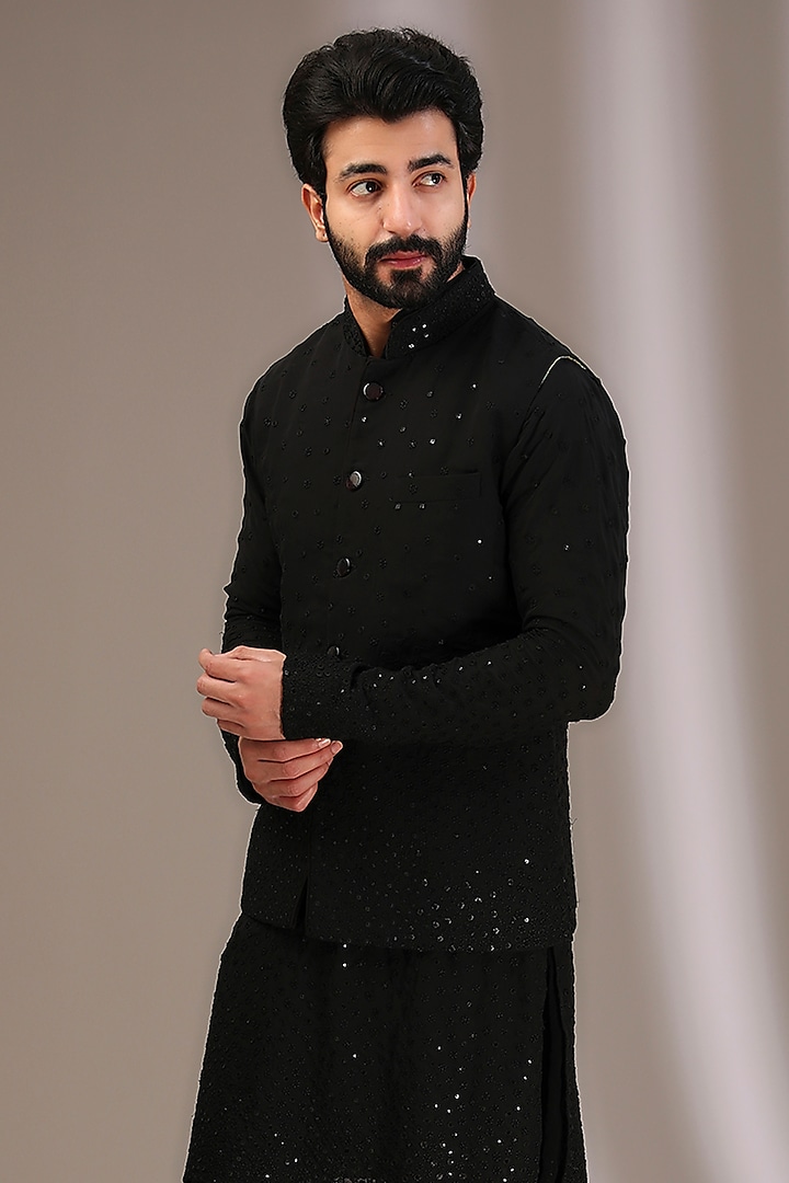 Black Georgette Thread & Sequins Embroidered Bundi Jacket by Rabani & Rakha Men