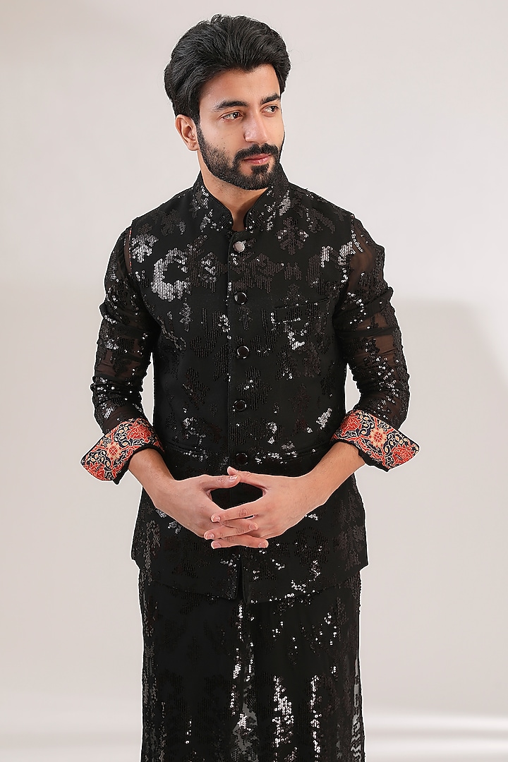 Black Georgette Sequins Embroidered Bundi Jacket by Rabani & Rakha Men