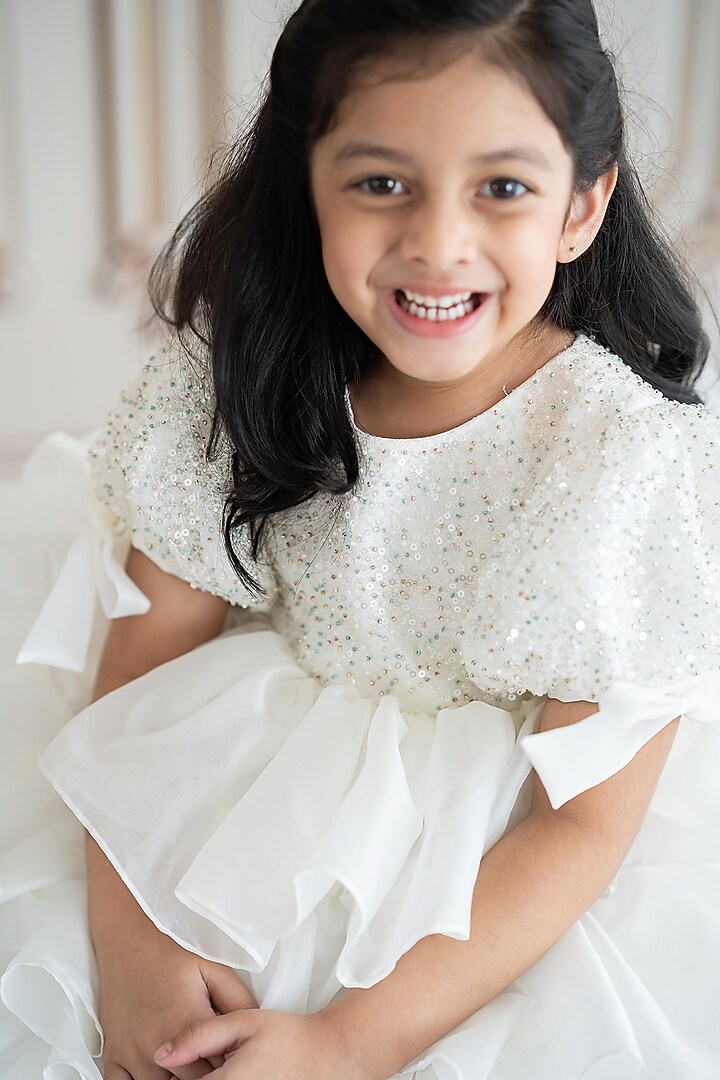 Off-White Soft Net & Butter Organza Hand Embroidered Dress For Girls by Ruchikalathlabel at Pernia's Pop Up Shop