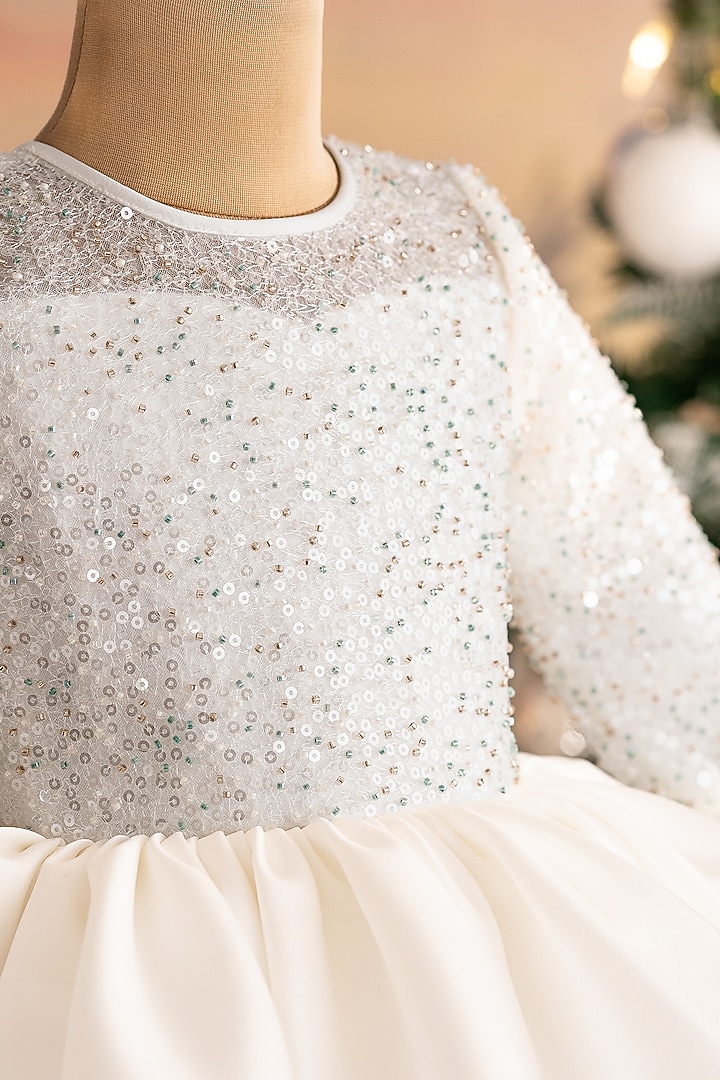 Off-White Soft Net & Butter Organza Cutdana Embroidered Dress For Girls by Ruchikalathlabel at Pernia's Pop Up Shop